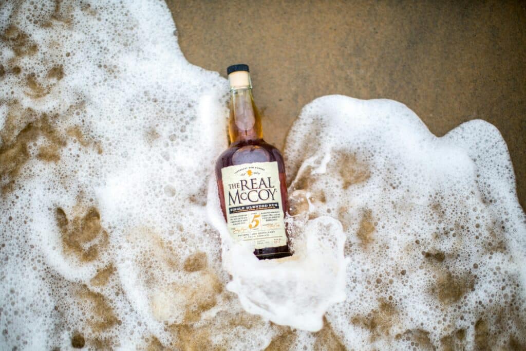 bottle of rum on beach